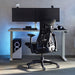 En Herman Miller X Logitech Embody Gaming Chair i sort som en del af et gaming-setup.