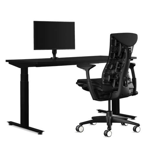 Herman Miller gaming bundle, featuring a Nevi sit-stand desk, Ollin monitor arm and a Logitech G Embody chair in black.